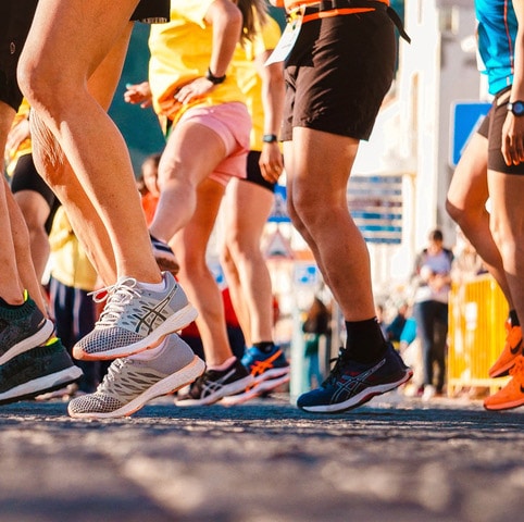 Vue sur des pieds de coureurs - CPC & Associés - Paris